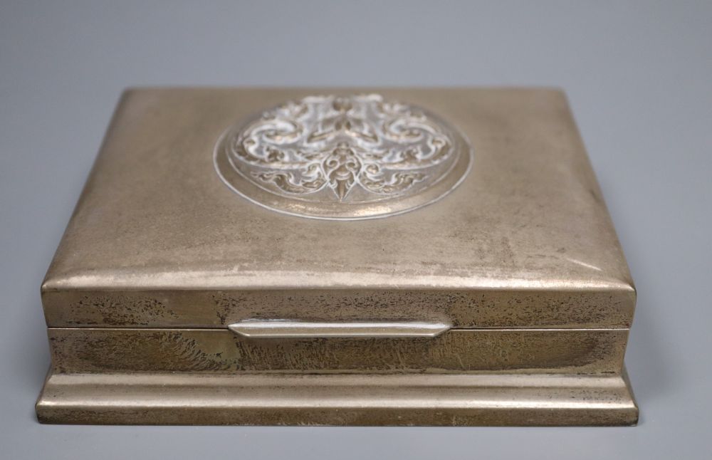 Three Thai white metal cigarette boxes, largest 16.1cm.